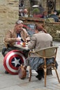 Two people in costume sat outside a cafe at the annual hebden bridge steampunk weekend