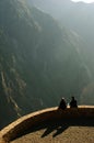 Two people on the edge of Colca Canyon Royalty Free Stock Photo