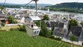 Tourist Riding in a Sesselbahn Chair Lift over the Vineyards in Rudesheim, Germany on the banks of the Rhine River Royalty Free Stock Photo