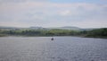 Two People Fishing in a Boat on Vartry Reservoir, County Wicklow