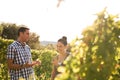 Two people having a chat in the vineyards Royalty Free Stock Photo