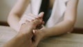 Two people holding hands for comfort. Giving a helping hand Royalty Free Stock Photo