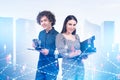 Two people and icons hologram with connection. Office buildings Royalty Free Stock Photo