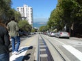 Two people look down the street in San Francisco