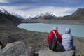 Two people looking at Tasman Glacier and Tasman Lake, New Zealand Royalty Free Stock Photo