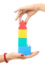 Two people making a toy house Royalty Free Stock Photo