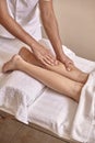 Two people, man physiotherapist leg massage, close up Royalty Free Stock Photo