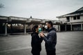 Two people in masks holding hands.Couple being divided by incurable infectious disease.Infection control,isolation.Loved one Royalty Free Stock Photo