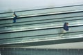 Two people moving on escalator Royalty Free Stock Photo