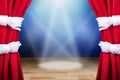 Two People Opening Red Stage Curtain Royalty Free Stock Photo