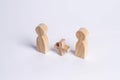 Two people with a plus in between. Wooden figures of persons. Friends, relatives, lovers. Social mathematics. Partner. Man plus ma Royalty Free Stock Photo