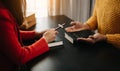 Two people reading and study bible in home and pray together.Studying the Word Of God With Friends Royalty Free Stock Photo