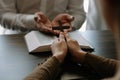 Two people reading and study bible in home and pray together.Studying the Word Of God Royalty Free Stock Photo