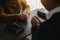 Two people reading and study bible in home and pray together.Studying the Word Of God Royalty Free Stock Photo