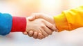 Two people share a handshake amidst vibrant fall colors, symbolizing trust and partnership in a serene autumn setting