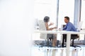 Two people talking in an office Royalty Free Stock Photo