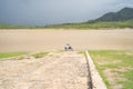 Two people with their motorcycle on the Corrinchis Dam in Mascota Jalisco.