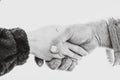 Two people touching and shaking hands. Hard worked hand, business concept with meeting, negotiation, partnership