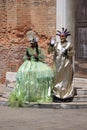 Two people in Venetian costume