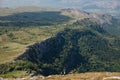 two people walking down the mountain on a hike journey on foot