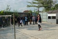 two people who are taking part in a badminton game