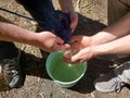 Aerial view bucket fish net and glass eels