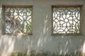 Two perforated windows Suzhou gardens. Royalty Free Stock Photo