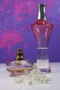 Two perfumes with white pearls Royalty Free Stock Photo