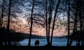 Two persons watching malaren sunset