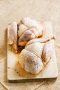 Two pheasants bird, plucked and stuffed on wood