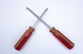 Two Phillips screwdrivers on white isolate Royalty Free Stock Photo