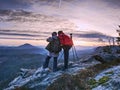 Two photographers with camera and tripod stay along path Royalty Free Stock Photo