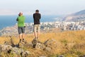 Two photographers taking picture of Tiberias sea. Royalty Free Stock Photo