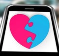 Two-Pieced Heart On Smartphone Showing Complement Royalty Free Stock Photo