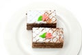 Two pieces of biscuit cakes on white plate Royalty Free Stock Photo