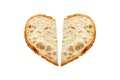 Two pieces of Bread in shape of broken heart isolated on white background, homemade bakery concept Royalty Free Stock Photo