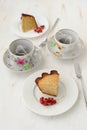 Two pieces of cake with two cups of tea Royalty Free Stock Photo