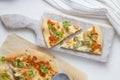 Two pieces of cheese pizza with artichoke and arugula Royalty Free Stock Photo