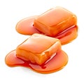 Two pieces of melted caramel candies