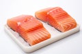 Two pieces of raw salmon steaks. Salmon piece of fresh raw fish on white background