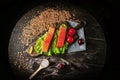 Two pieces of smoked fish Pink salmon on shale board. Fish close up. Royalty Free Stock Photo