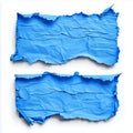 Two pieces of torn and crumpled blue paper on a white background creating a textured effect visual Royalty Free Stock Photo