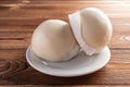 Two pieces traditional Chinese buns on wood table