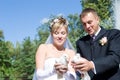 Two pigeons and newly-married couple Royalty Free Stock Photo