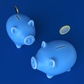 Two piggy banks over dark blue background. Top view.