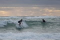 Two Piha surfers Royalty Free Stock Photo