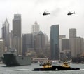 Two pilot vessels and two helicopters are dancing at Circular Quay.