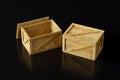 Two pine wooden boxes isolated on a black background Royalty Free Stock Photo