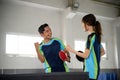 Two ping pong players compete excitedly when they score points Royalty Free Stock Photo