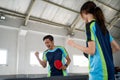 Two ping pong players competing with fists Royalty Free Stock Photo